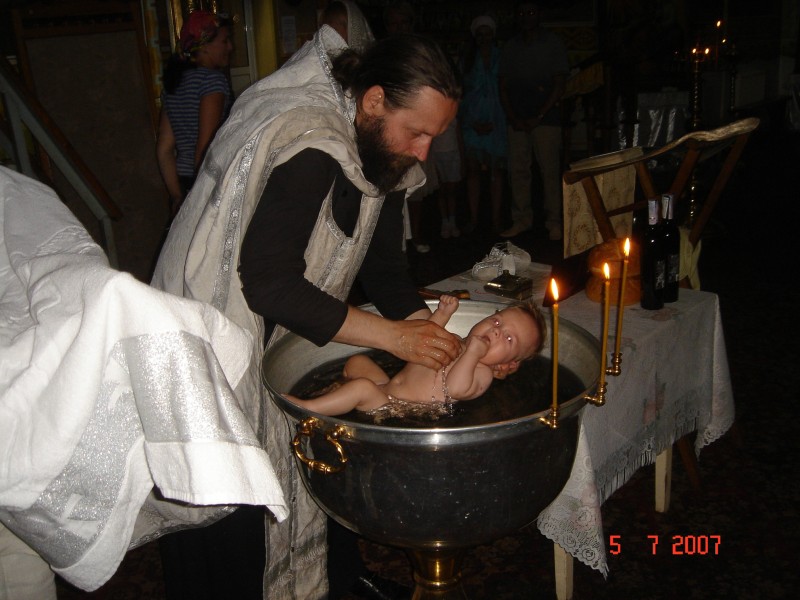 Act of baptizing