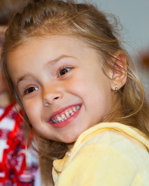 an amazing blond child girl in a Catholic kindergarten photographed in November 2013, picture 2