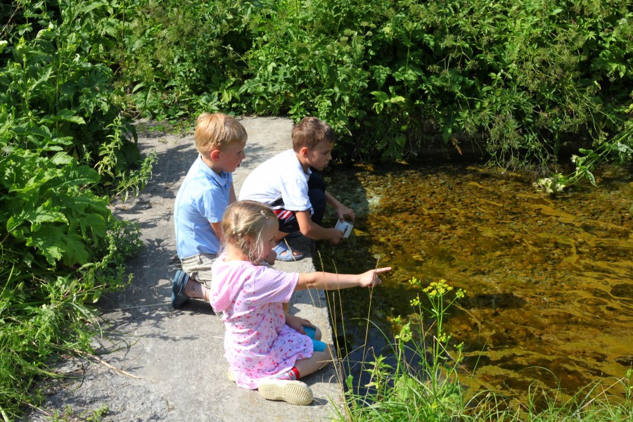 Children near a water spring, photo 2.
