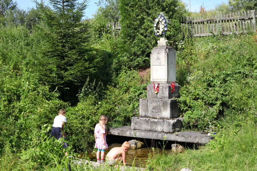 Children near a water spring