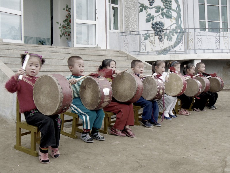 Drumming children