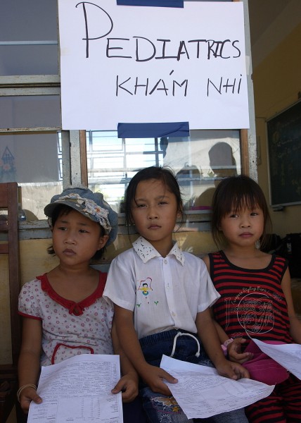 US Navy 070716-N-1752H-037 Children wait in line for a routine check up during a medical civic assistance program at Truong Tieu Hoc Quy School