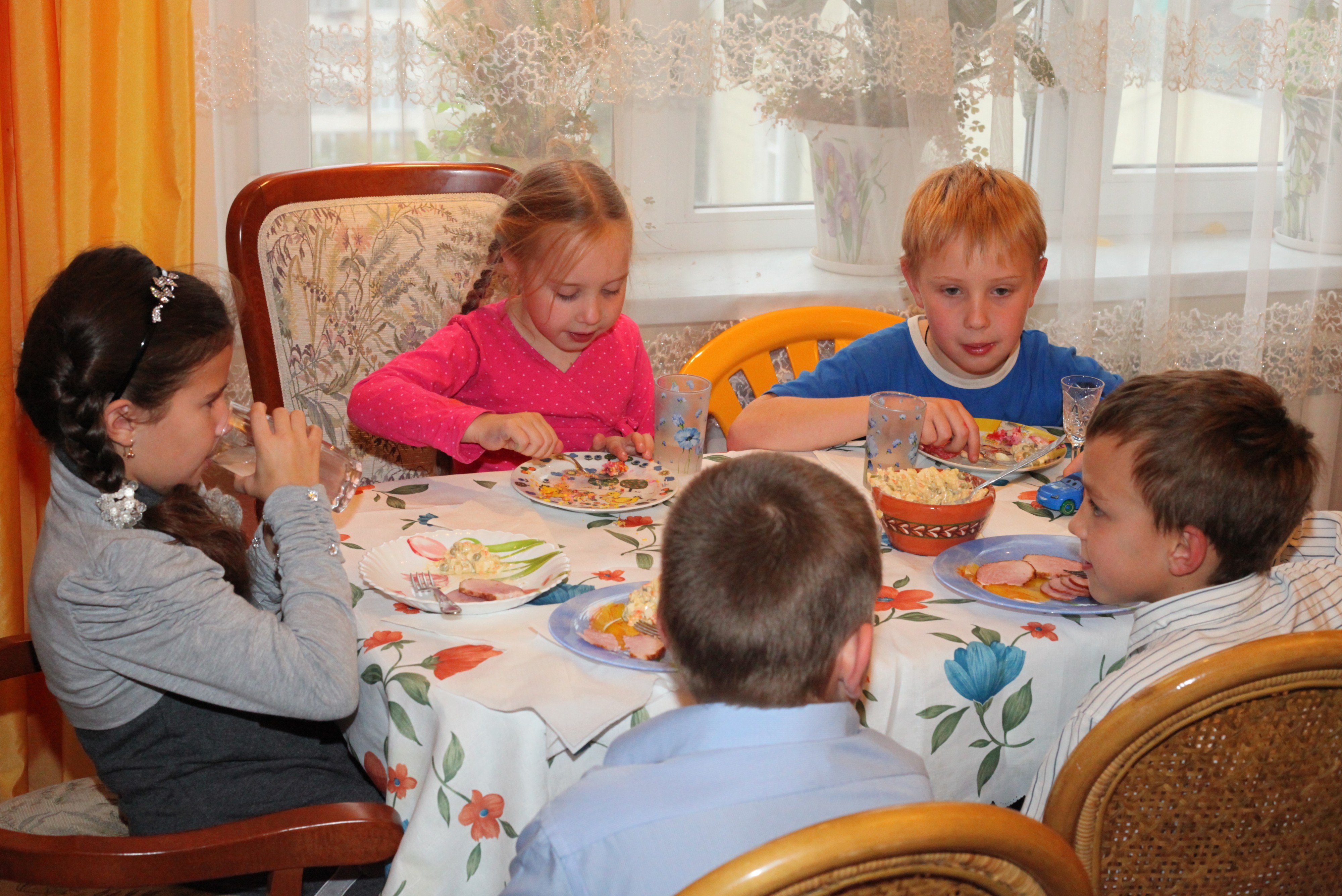 children having meal on a birthday party