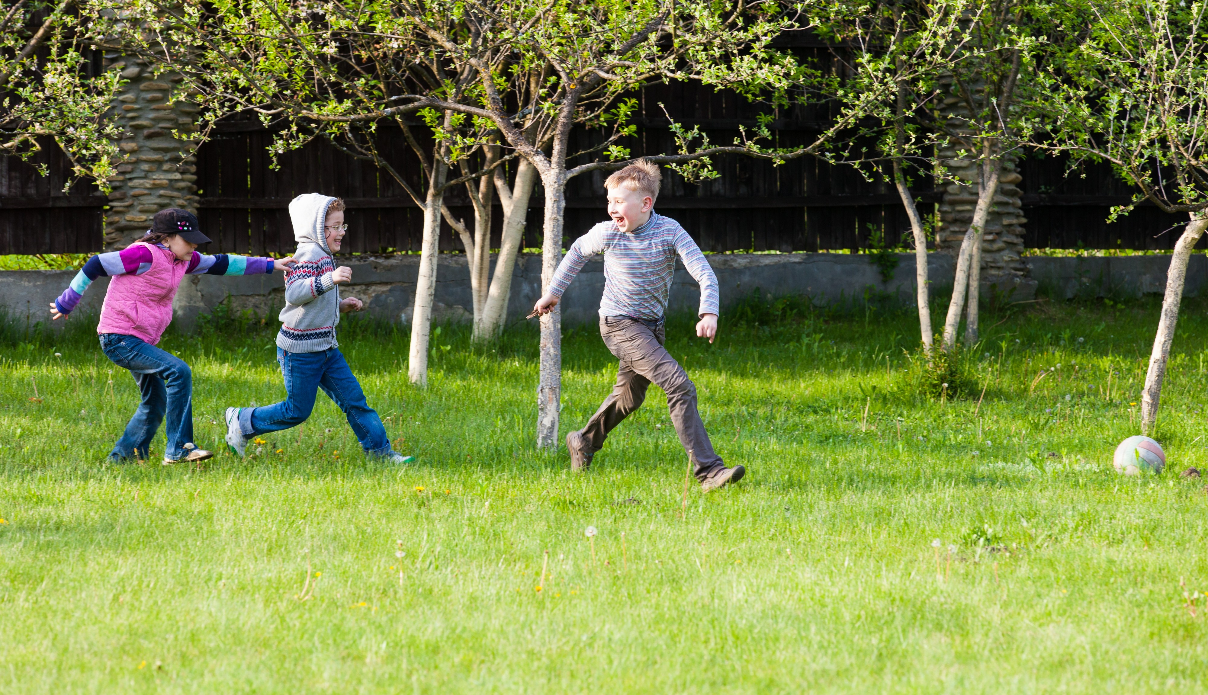 children running on the grass in May 2014