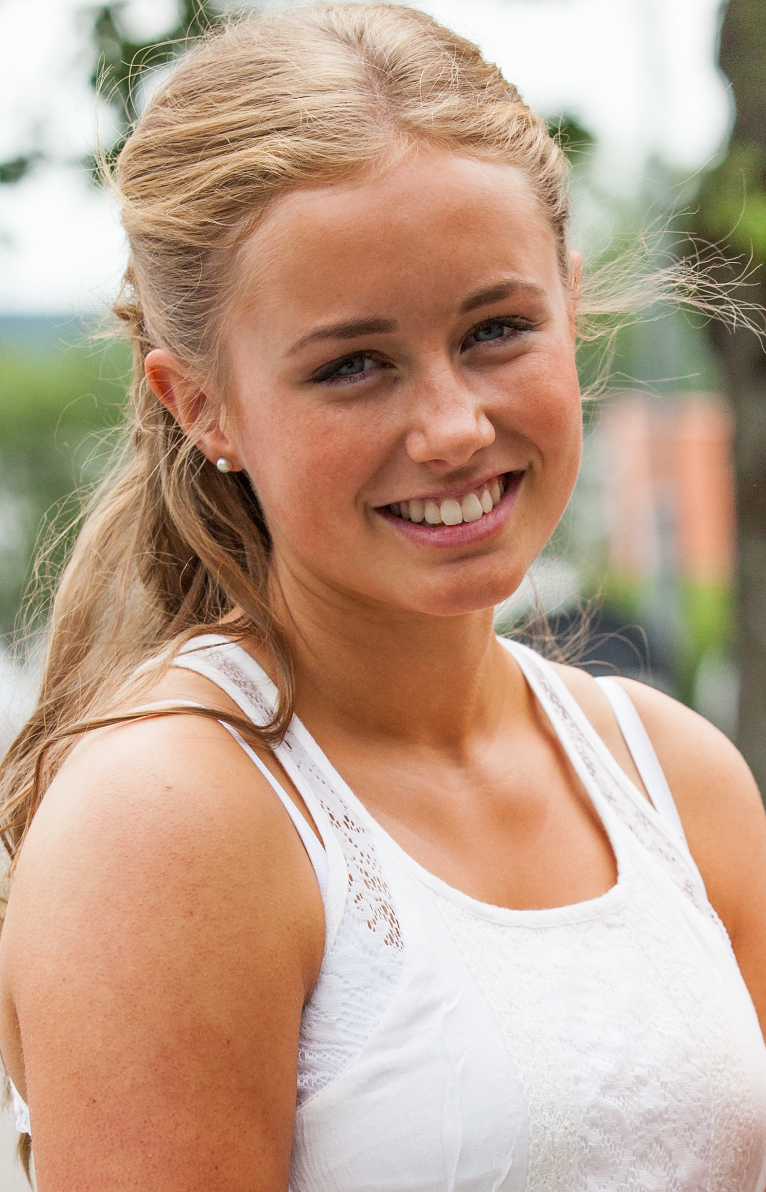 a blond beautiful girl photographed in Sigtuna, Sweden in June 2014, picture 1 out 20