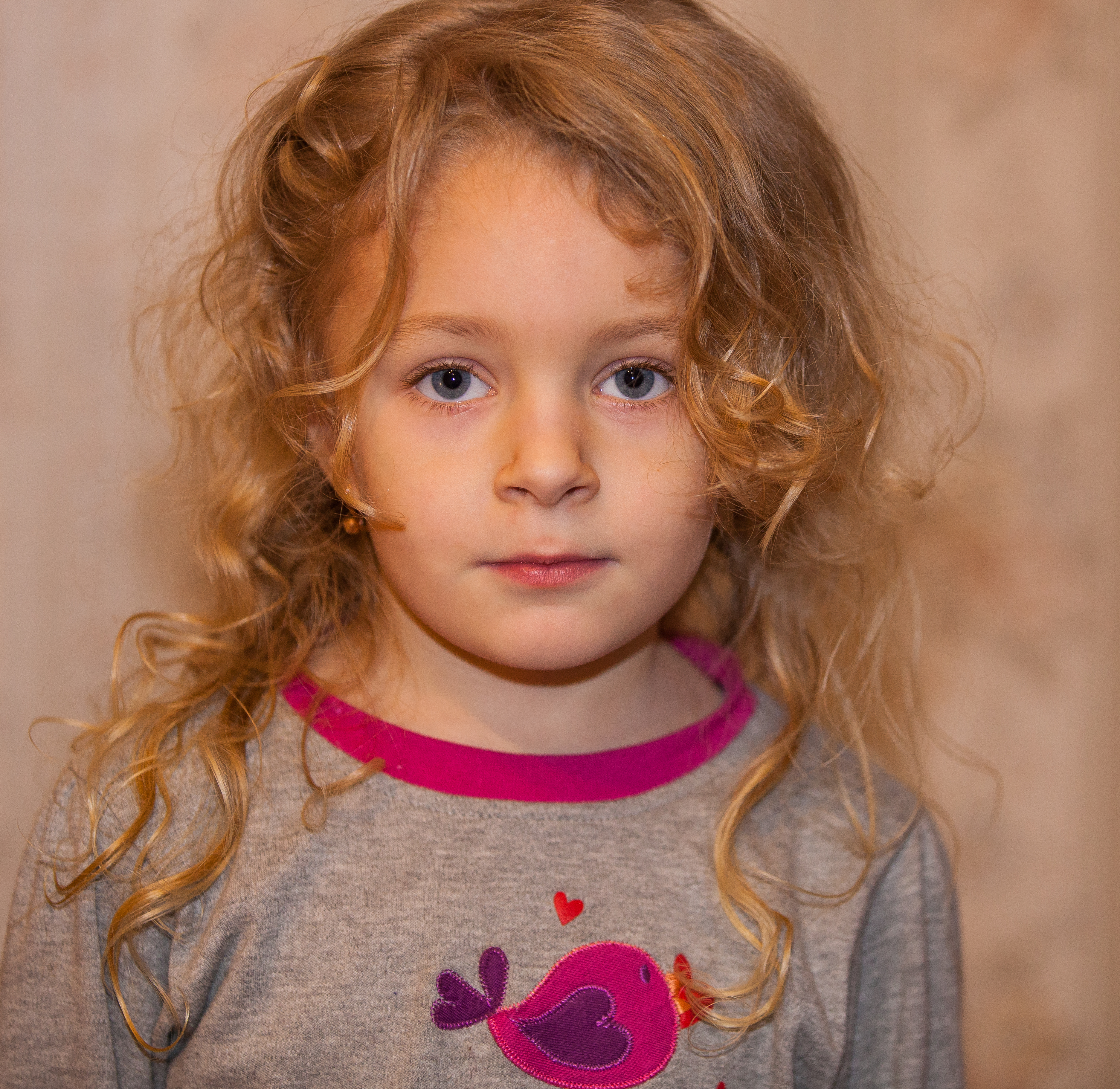 a cute blond child girl photographed in January 2014, photo 1 out of 4