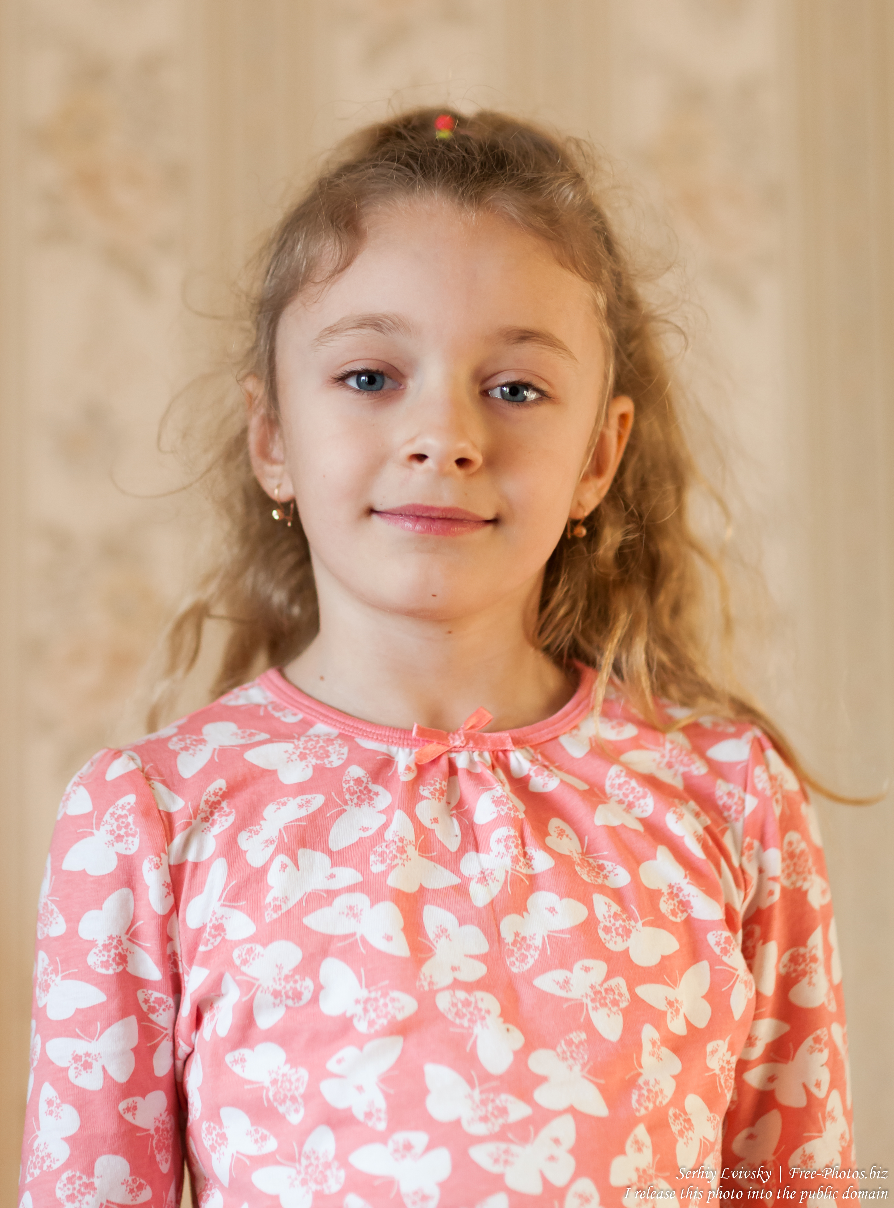 a cute blonde child girl photographed in March 2017, picture 3