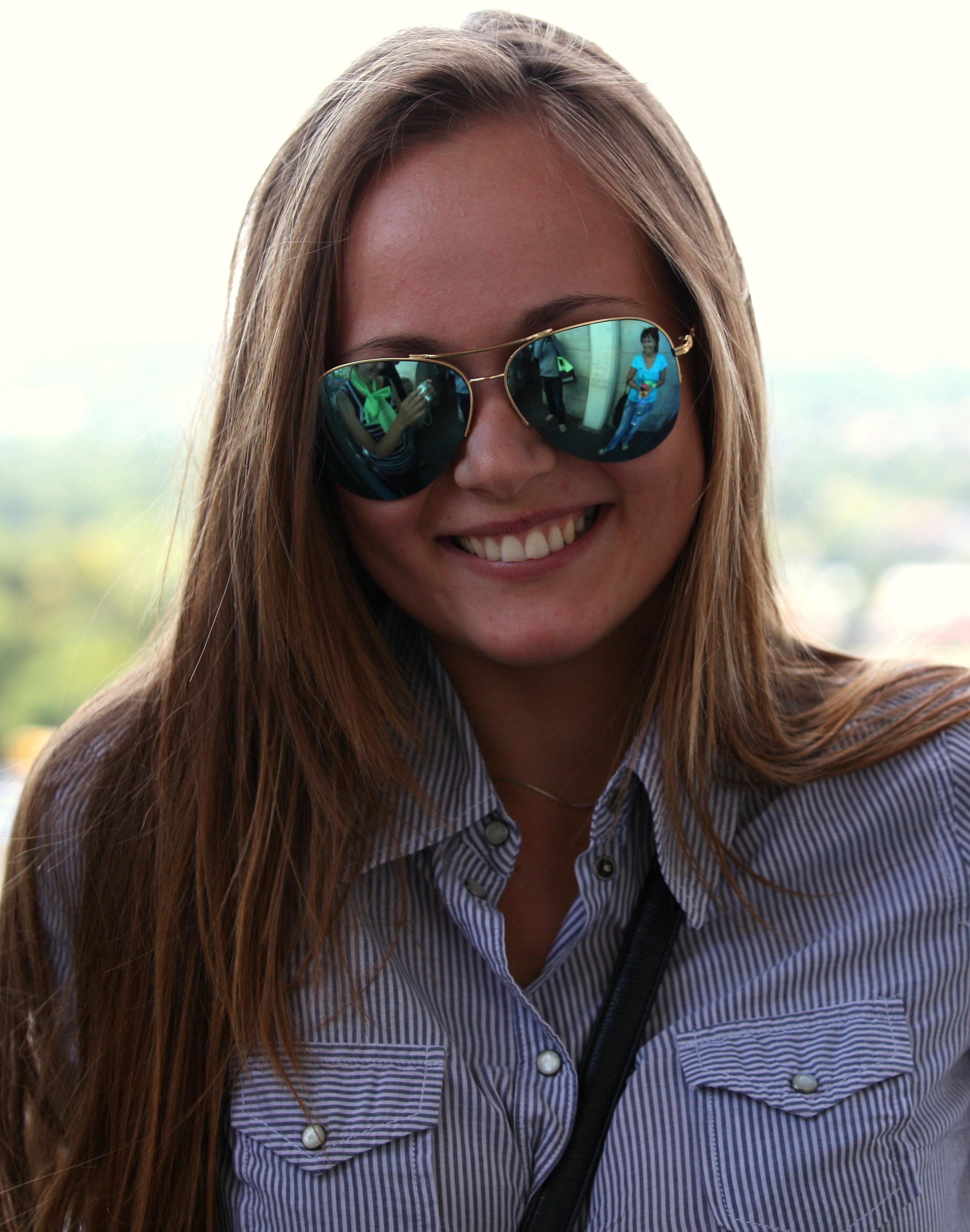 an attractive girl wearing sunglasses in August 2013, picture 2