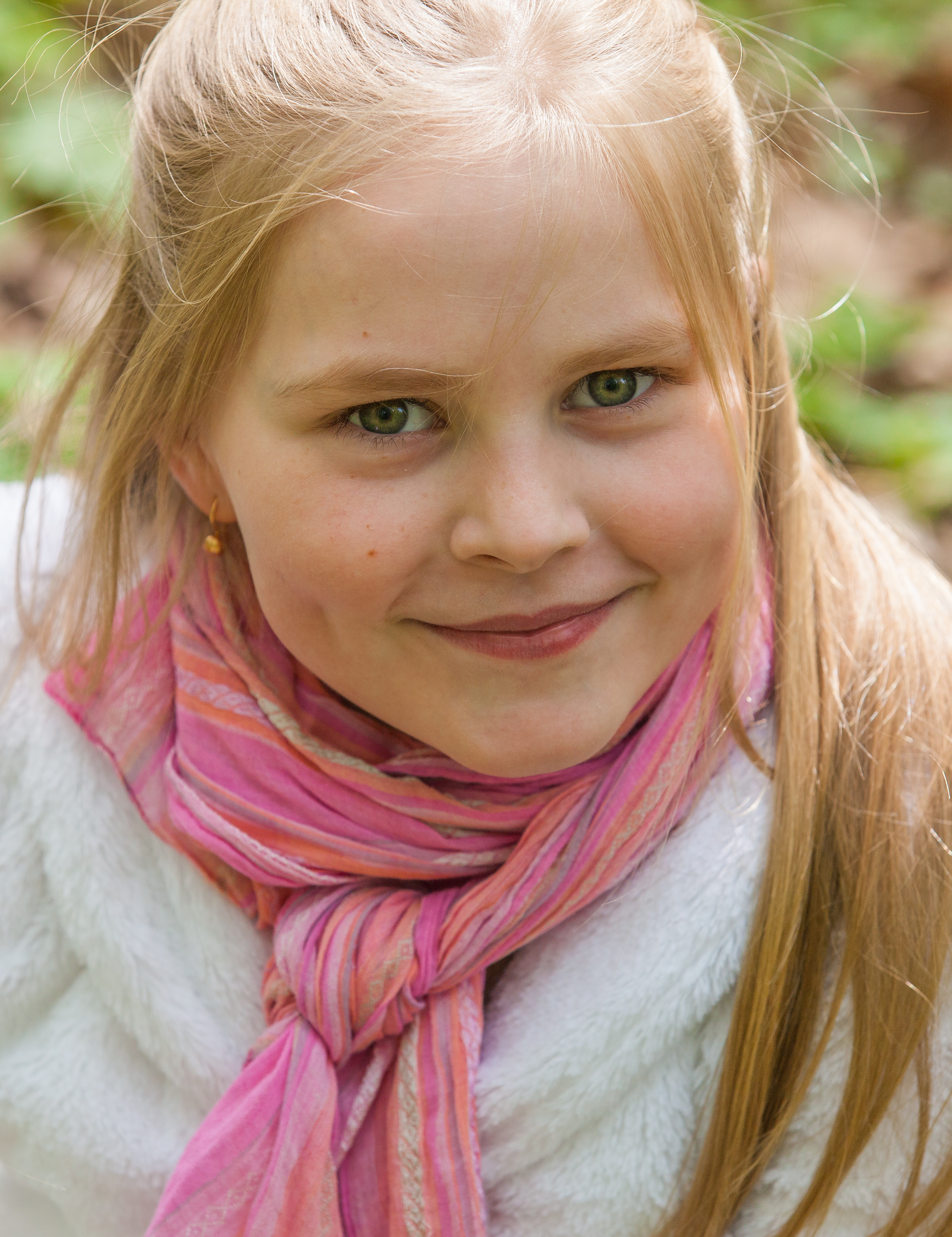 a cute Roman-Catholic blond child girl photographed in April 2014, portrait 19/29