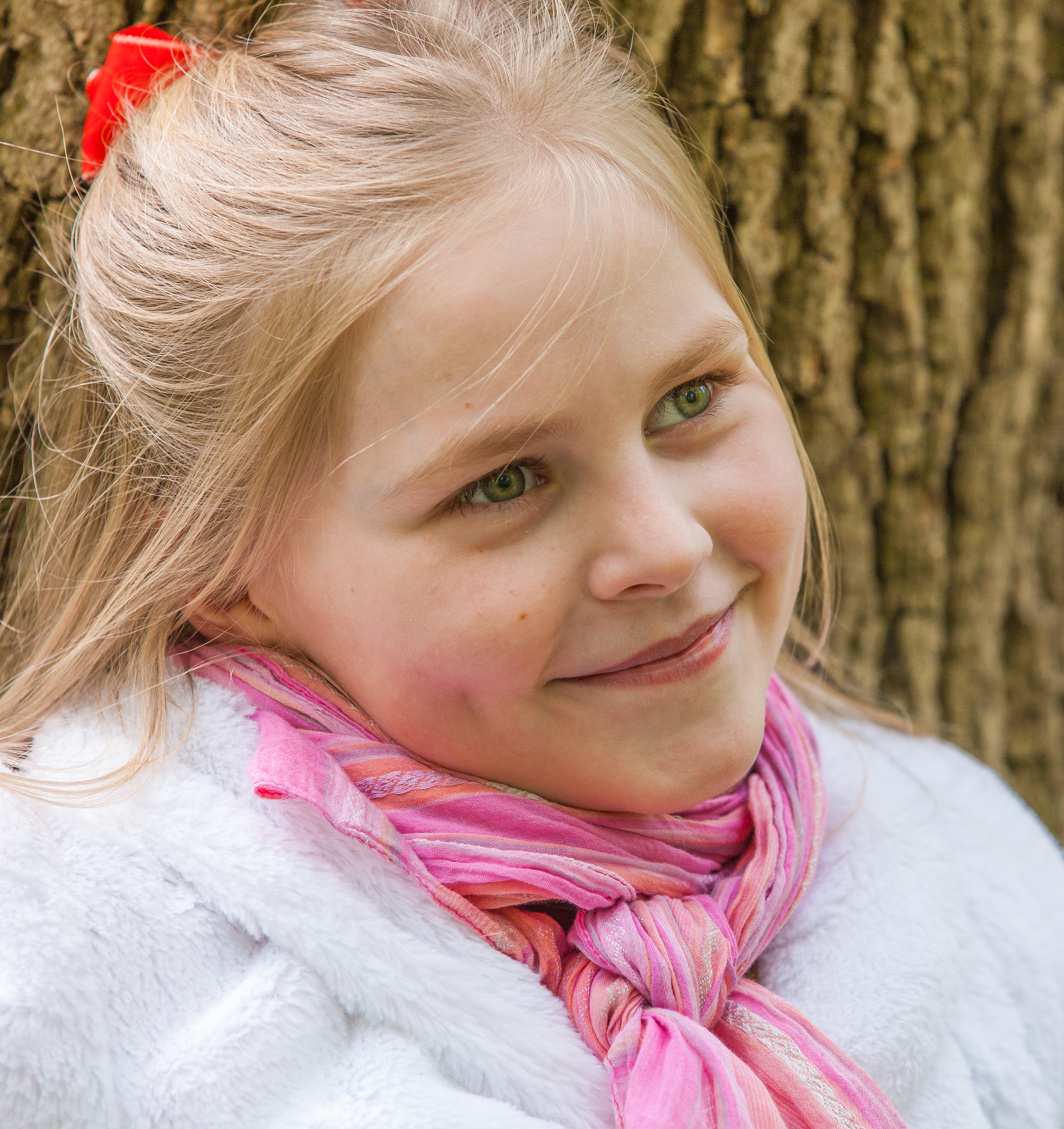 a cute Roman-Catholic blond child girl photographed in April 2014, portrait 20/29