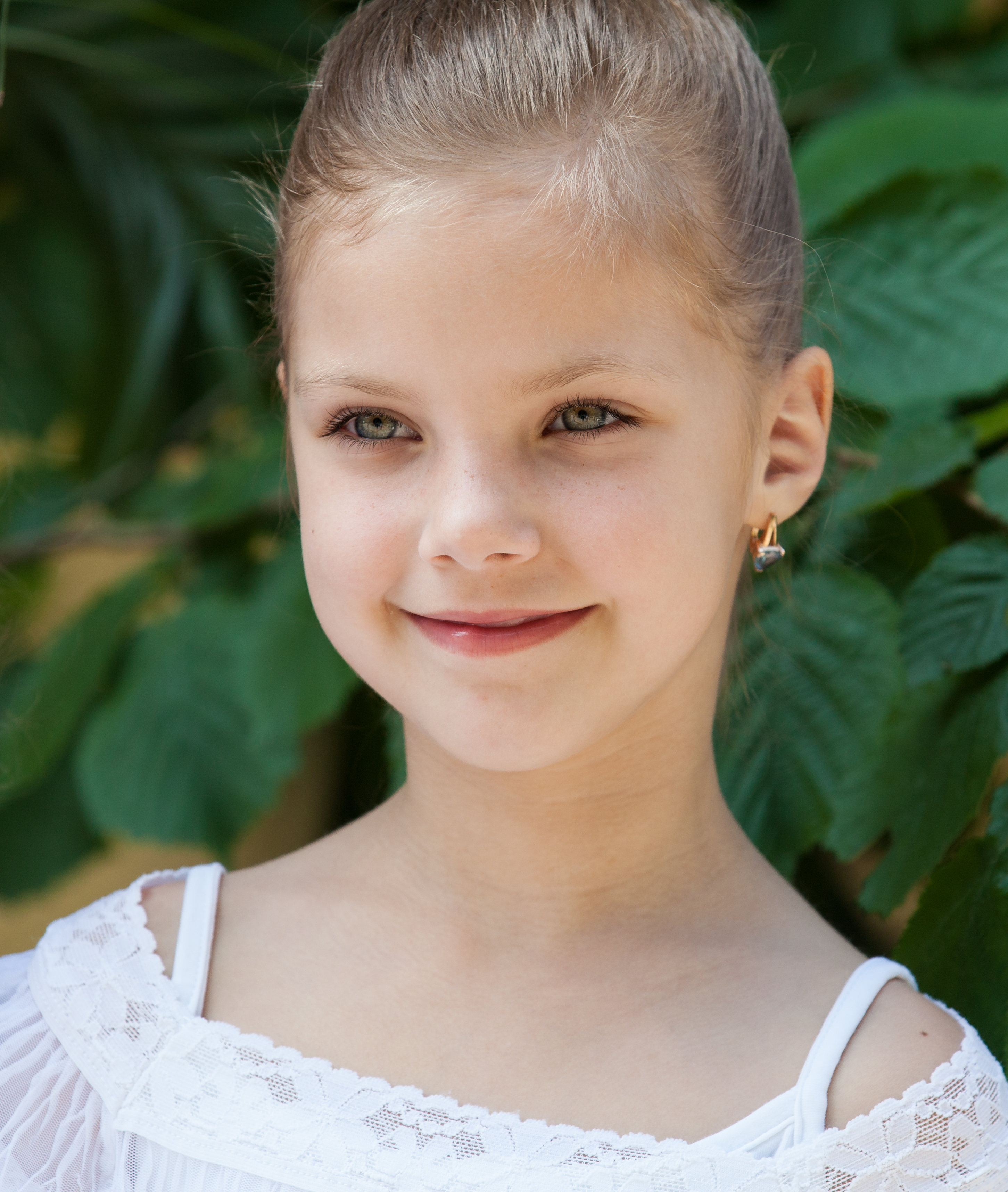 a fair-haired cute child girl photographed in June 2014, picture 1/2