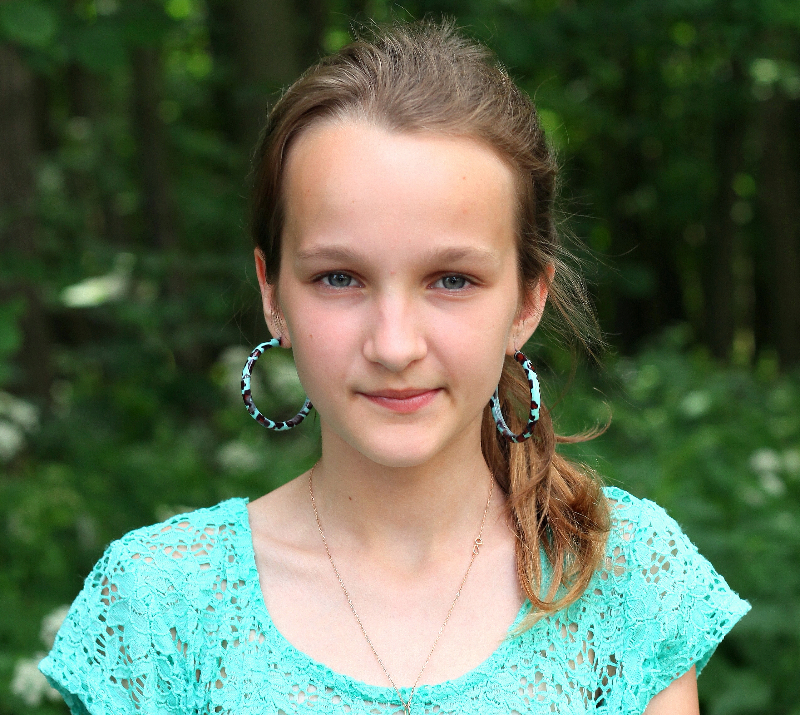 a charming beautiful girl with huge earrings, photographed in June 2013, portrait 14/27