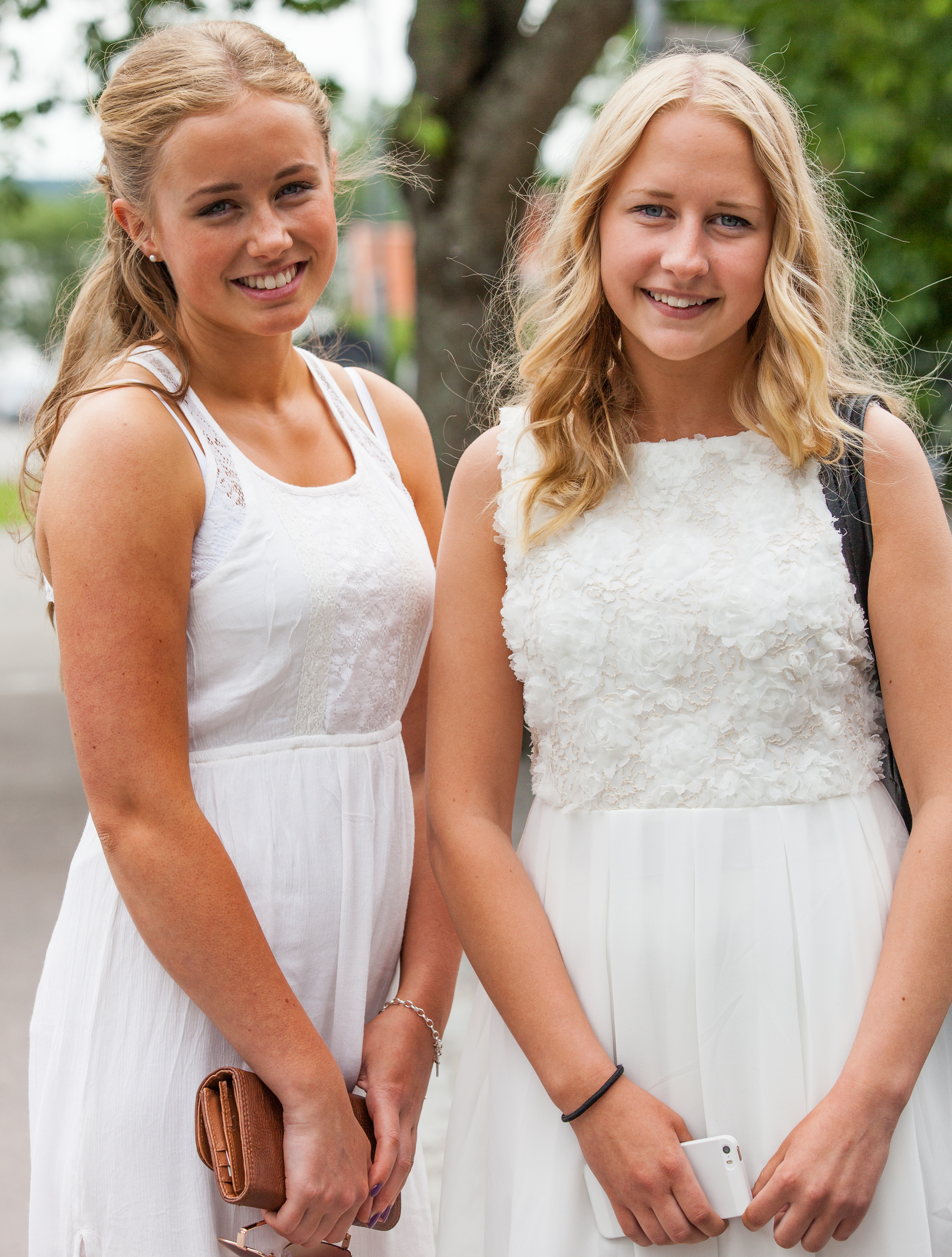 two beautiful blond girls wearing white dresses in Sigtuna, Sweden in June 2014, picture 2