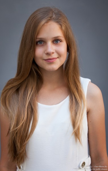 a 12-year-old blond girl wearing a white dress photographed in July 2015 by Serhiy Lvivsky, picture 9