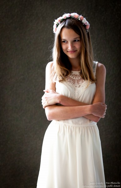 a 13-year-old Catholic girl in a white dress photographed in June 2015, picture 9