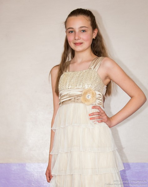 a beautiful schoolgirl wearing a dress photographed in June 2015, picture 16