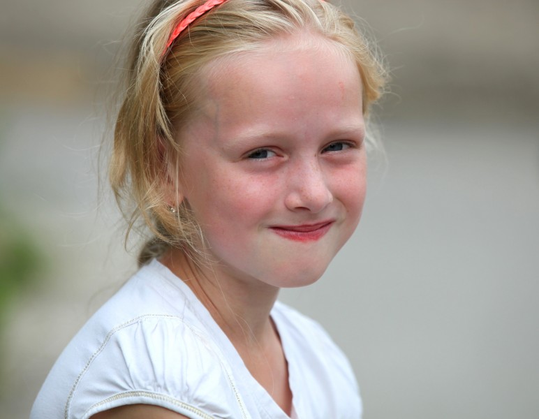 a beautiful young blond charming Catholic girl in a Christian camp in July 2013, picture 3/8
