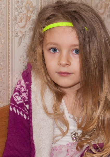 a blond child girl photographed in April 2015