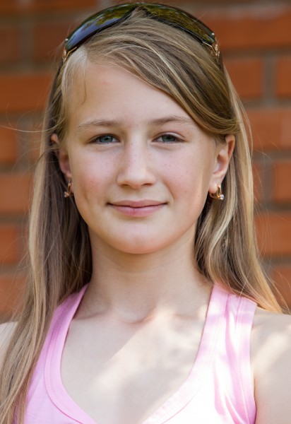 a blond girl of Catholic confession photographed in May 2014, portrait 5/21