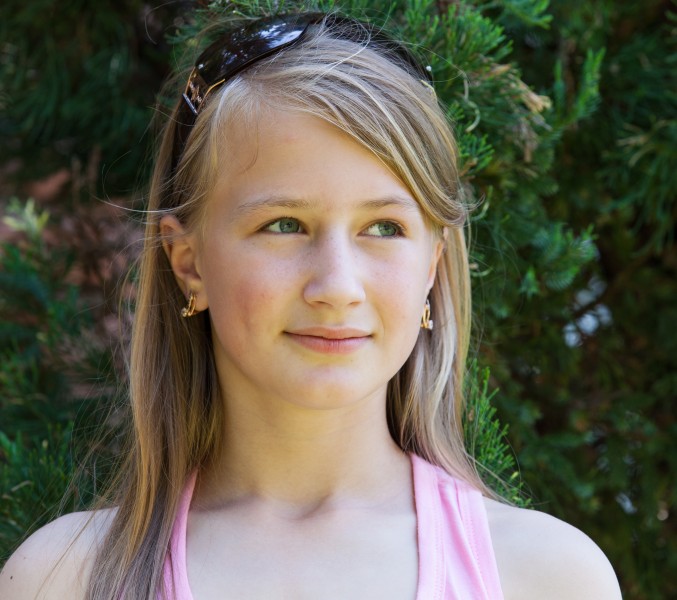 a blond girl of Catholic confession photographed in May 2014, portrait 11/21