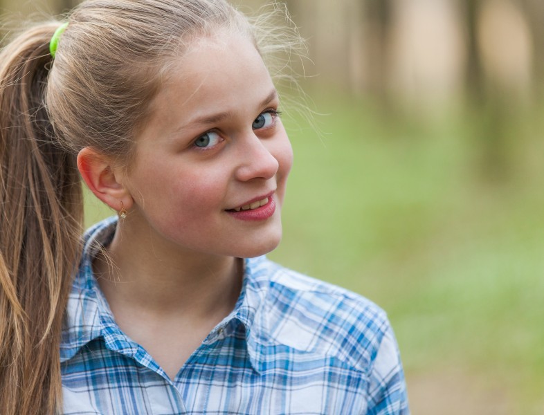 a cute blond 12-year-old girl photographed in April 2015, picture 7