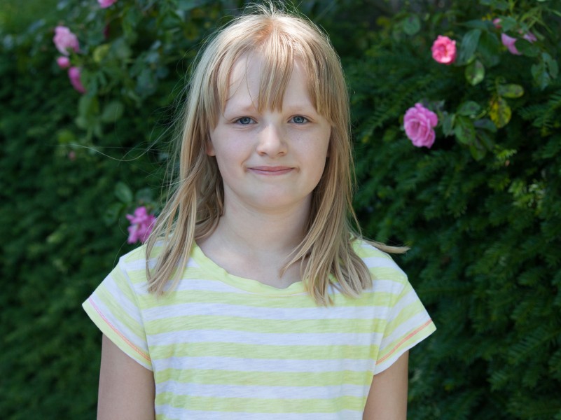 a cute fair-haired girl in Copenhagen, Denmark, in June 2014, picture 6