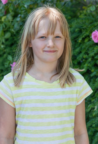 a cute fair-haired girl in Copenhagen, Denmark, in June 2014, picture 8