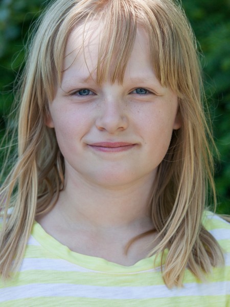 a cute fair-haired girl in Copenhagen, Denmark, in June 2014, picture 12