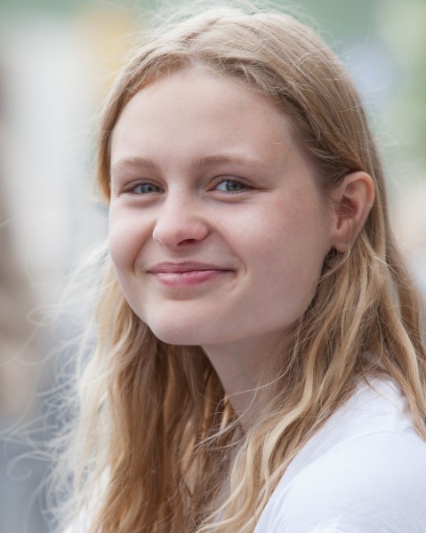 a cute fair-haired girl in Copenhagen, Denmark, in June 2014, picture 44