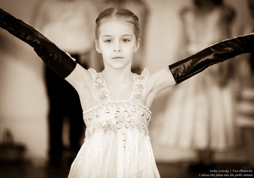 a cute schoolgirl dancing in March 2015, picture 1