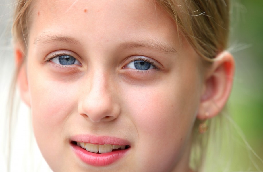a closeup of a beautiful sweet blond young Roman-Catholic girl in a Christian camp in July 2013, portrait 4/5