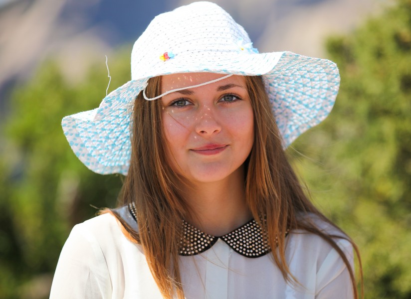 a cute Catholic girl in a hat photographed in August 2013, photo 2