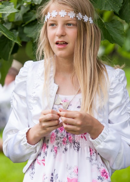 a blond pretty girl photographed in Uppsala, Sweden in June 2014, picture 25/34