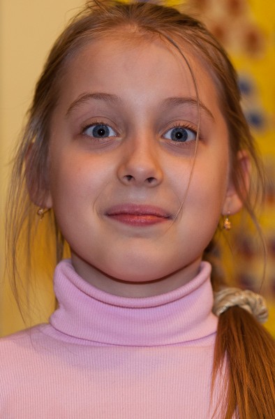 a young Catholic fair-haired pretty girl photographed in March 2014, image 6/6