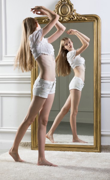 Adriana - a 15-year-old tall thin girl with big grey eyes and natural lips, the eighth photo session by Serhiy Lvivsky, taken in June 2026, portrait 52/64
