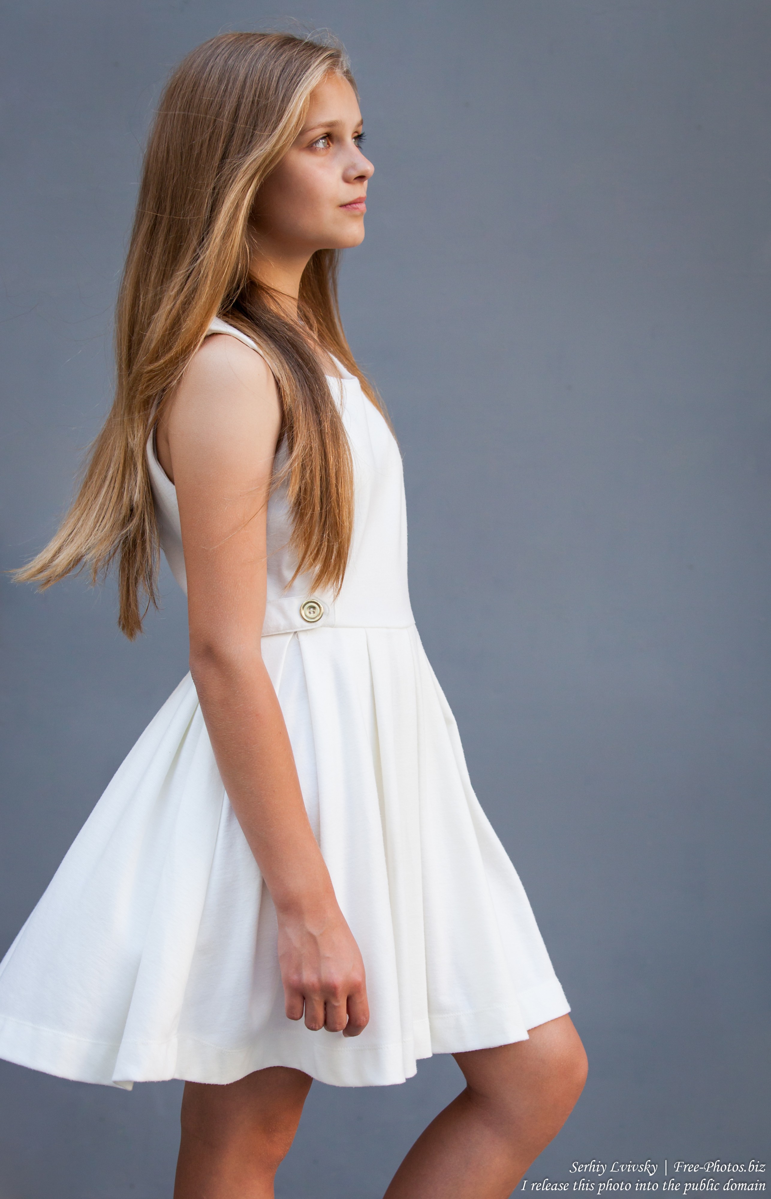 a 12-year-old blond girl wearing a white dress photographed in July 2015 by Serhiy Lvivsky, picture 12