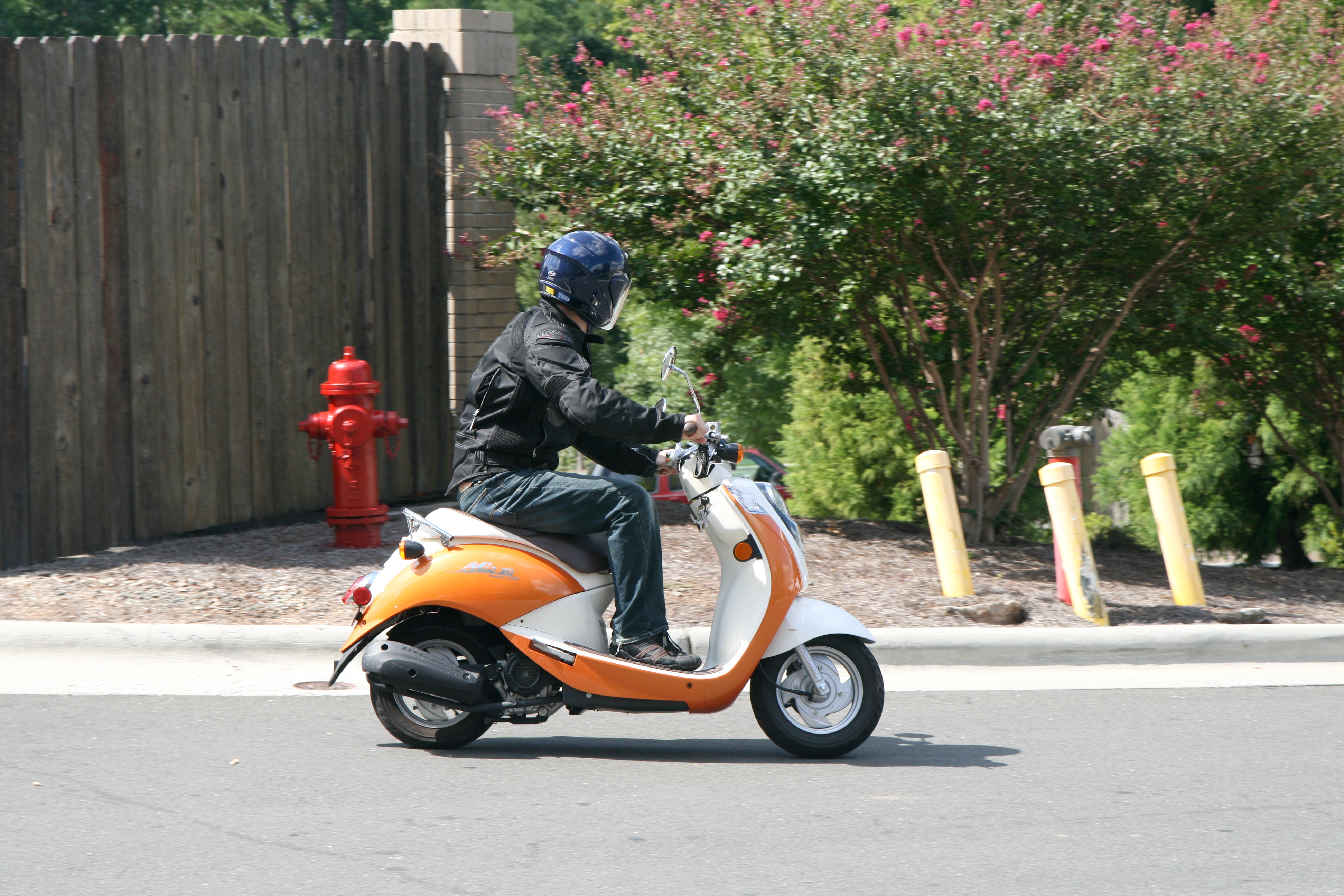 2011-09-10 Rider on SYM Mio scooter