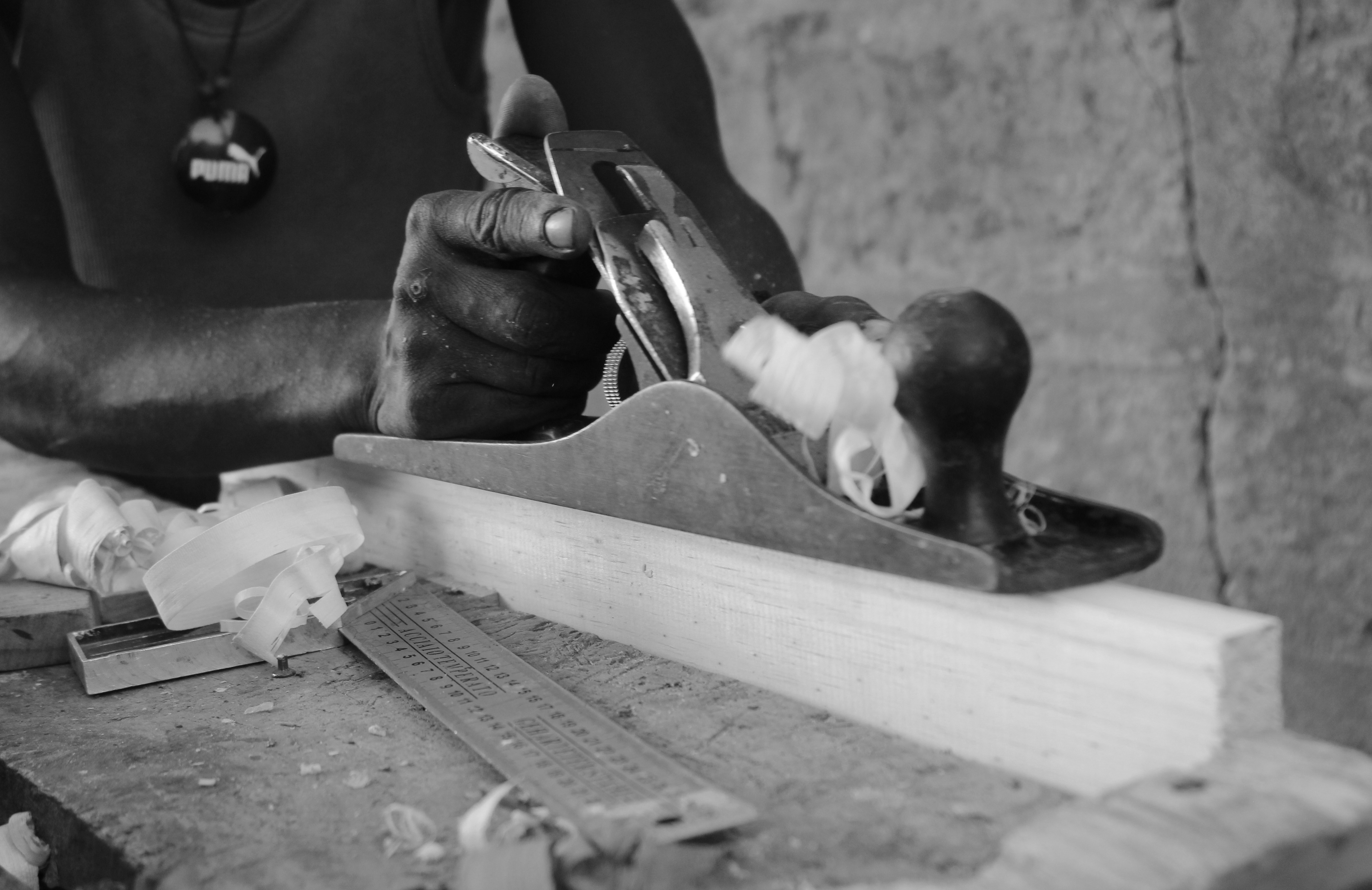 A man is doing carpentry