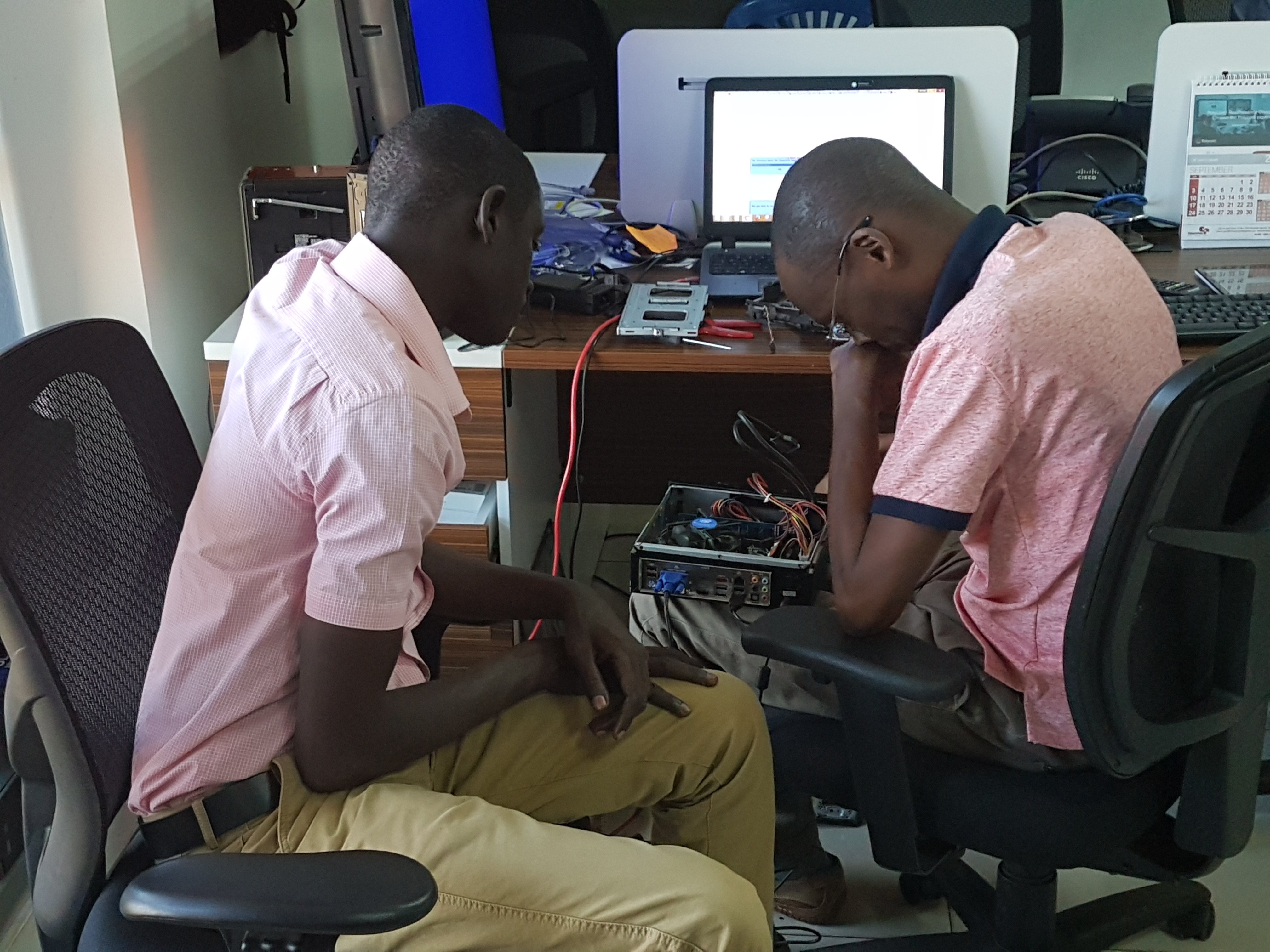 Ahmed and Richard at work