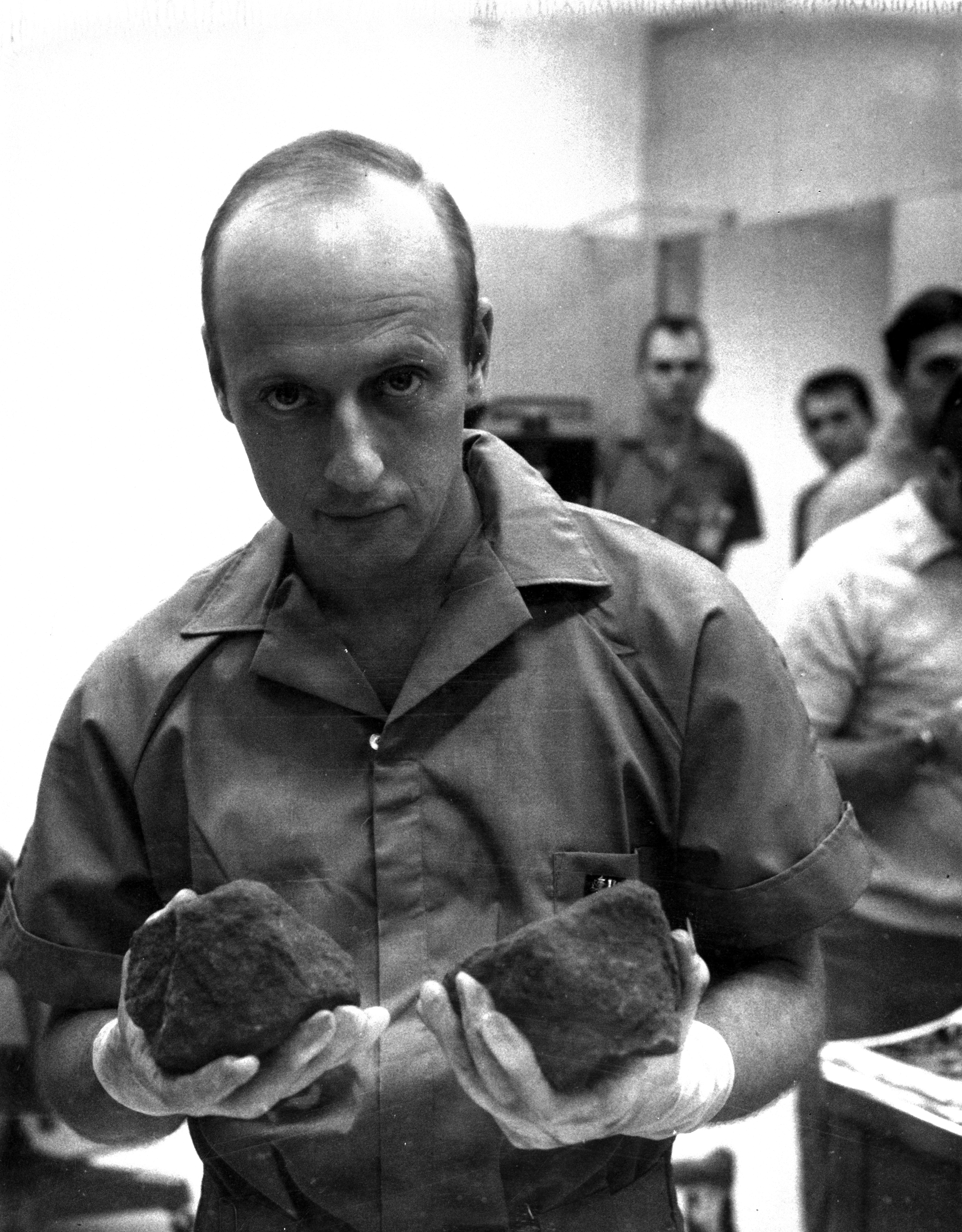 Apollo 12 Conrad with moon rocks