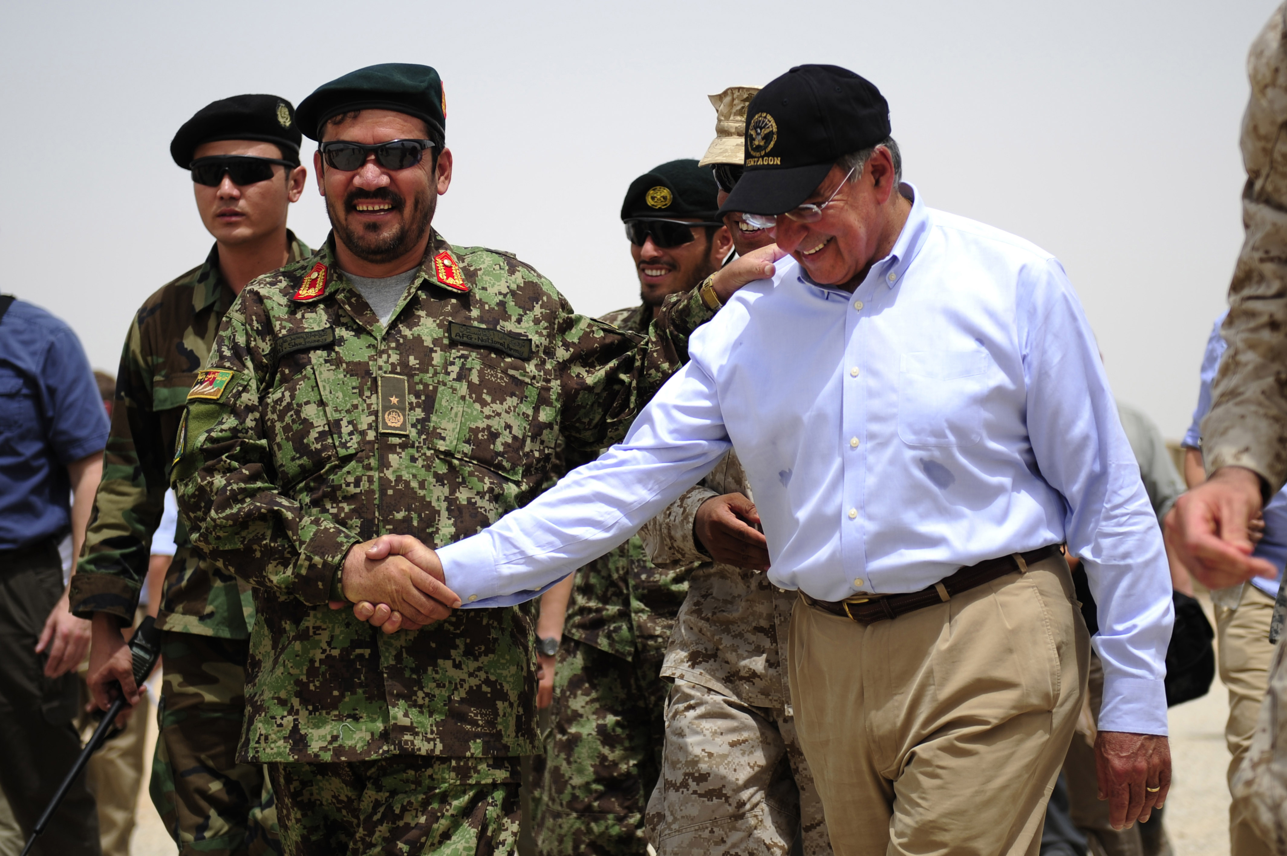 Defense.gov News Photo 110710-F-RG147-481 - Secretary of Defense Leon E. Panetta shakes hands with the commander of Afghanistan Garrison Support Unit 1-215 Embedded Training Team at Camp