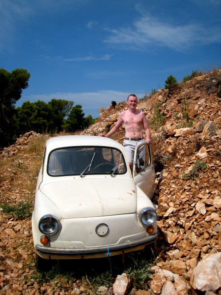 A man next to a white Zastava 750 or 850