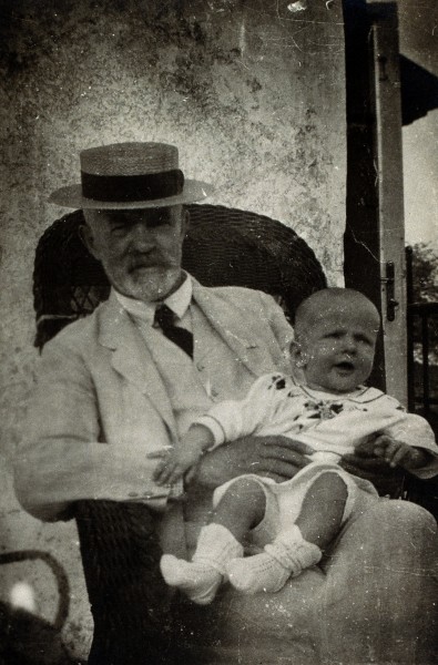 Anton Freiherr von Eiselsberg with a baby. Photograph. Wellcome V0026332