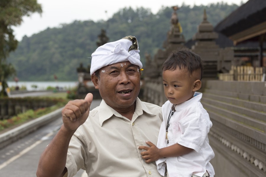 Brantan Bali Indonesia Grandfather-and-grandson-after-Puja-01