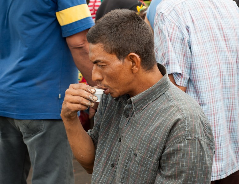 Coffee drinking vegetable seller