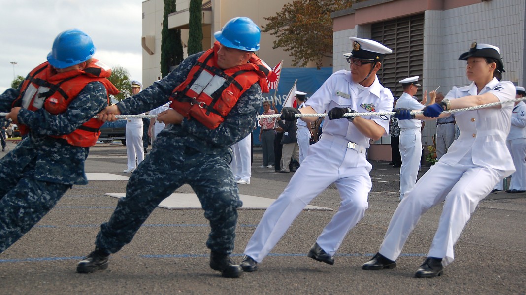 Defense.gov News Photo 100608-N-7498L-163 - U.S. Navy Seaman Colton Sears left and Petty Officer 2nd Class Aaron Boyer both assigned to USS Lake Erie CG 70 work alongside Japanese navy