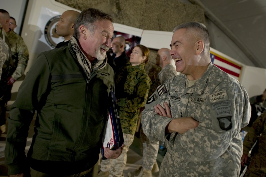 Defense.gov News Photo 101215-N-0696M-193 - Comedian Robin Williams visits with Commanding General of Combined Task Force 101 U.S. Army Lt. Gen. John F. Campbell after the USO Holiday Tour