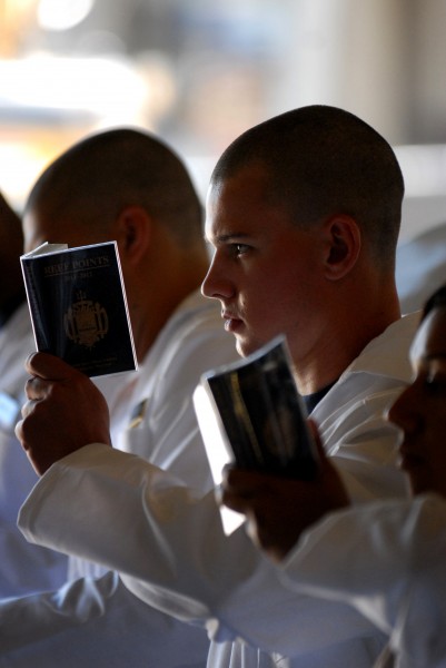 Defense.gov News Photo 110629-N-OA833-005 - Plebes in the U.S. Naval Academy Class of 2015 stand at attention and begin memorizing portions of Reef Points while reporting to the school s