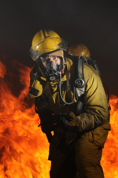 Defense.gov News Photo 110708-N-WP746-073 - U.S. Navy Petty Officer 1st Class Hector Floresdiaz demonstrates firefighting techniques to students attending the Center for Naval Engineering