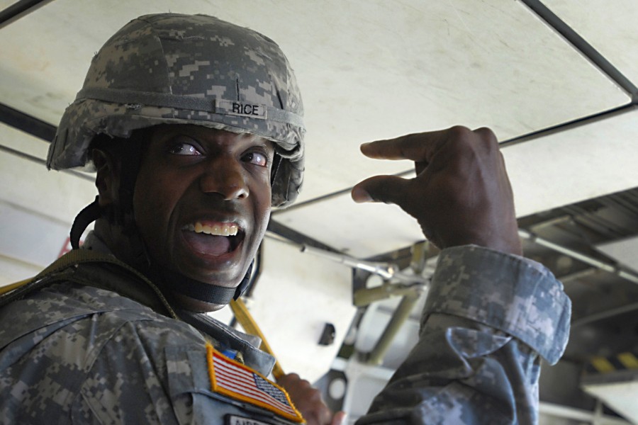 Defense.gov News Photo 110802-A-FS865-053 - Army Master Sgt. Sean Rice gives the hand signal for 30 seconds during an airborne operation in a Casa 212 aircraft over St. Mere Eglise drop zone